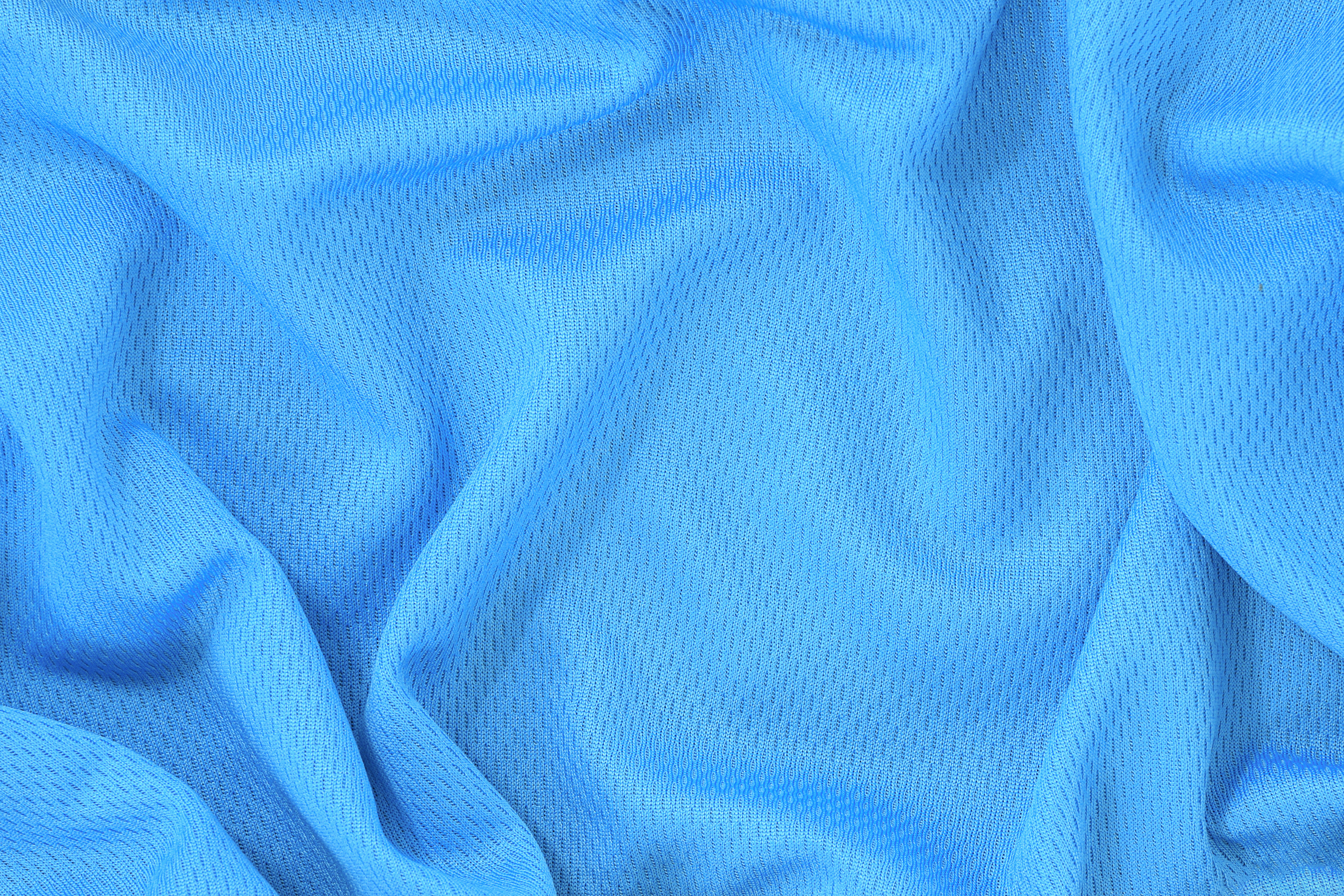 Blue polyester fabric texture background, sports wear background