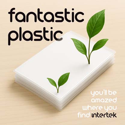 A stack of plastic sheets with green plants emerging from the top