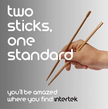 A pair of wooden chopsticks being wielded
